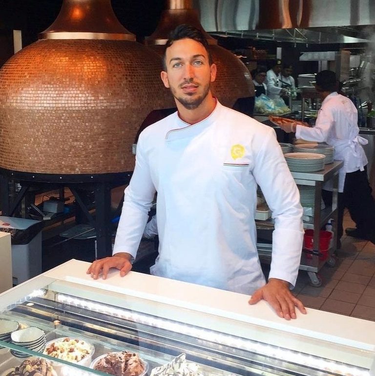 Antimo, Naples-born pizza chef in his chef jacket, founder of Antimo Pizza Chef